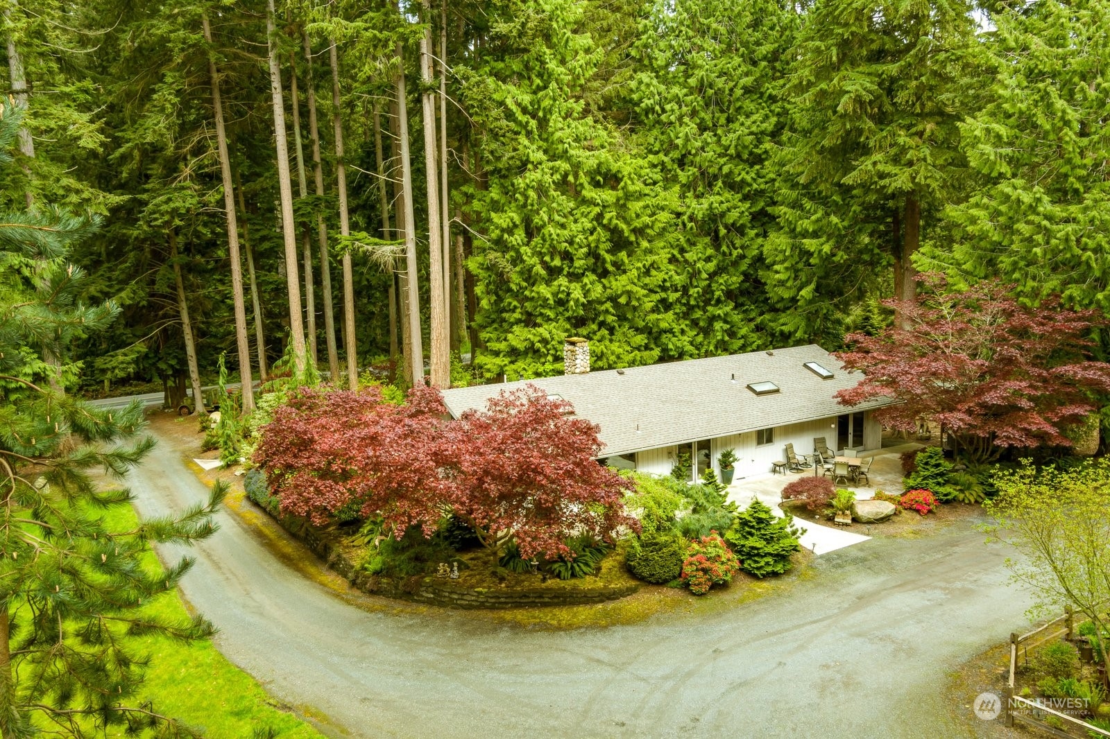5003 East Harbor Road Freeland, WA 98249 - Photo 7 of 40 a view of a garden