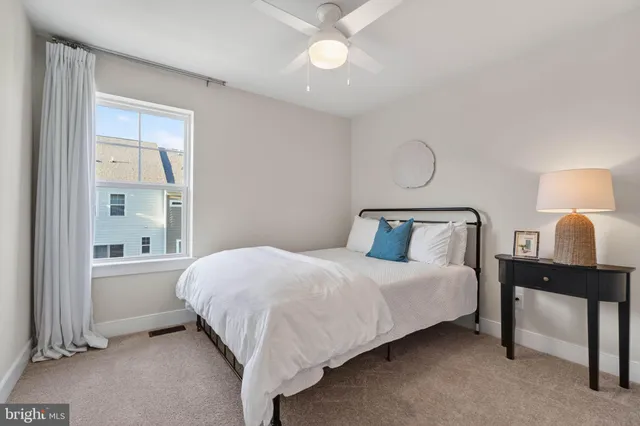 a view of a brick building next to a yard