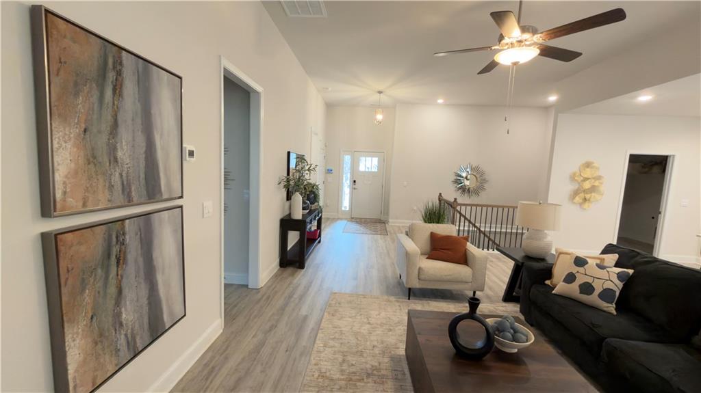 620 Bald Ridge Circle Demorest, GA 30535 - Photo 13 of 43 a living room with furniture and a flat screen tv