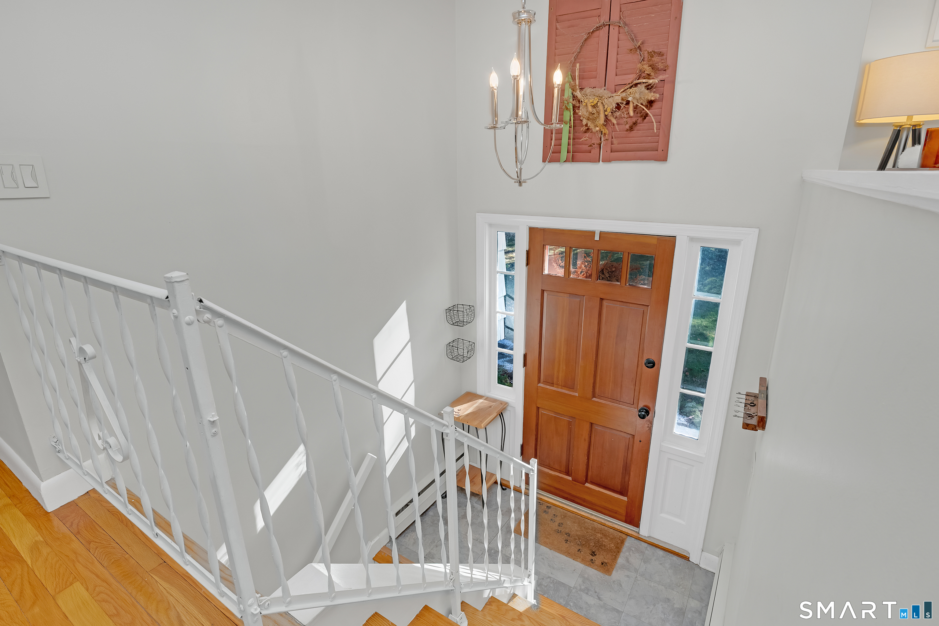 16 Marion Road Bethany, CT 06524 - Photo 4 of 40 a view of entryway and hall with wooden floor