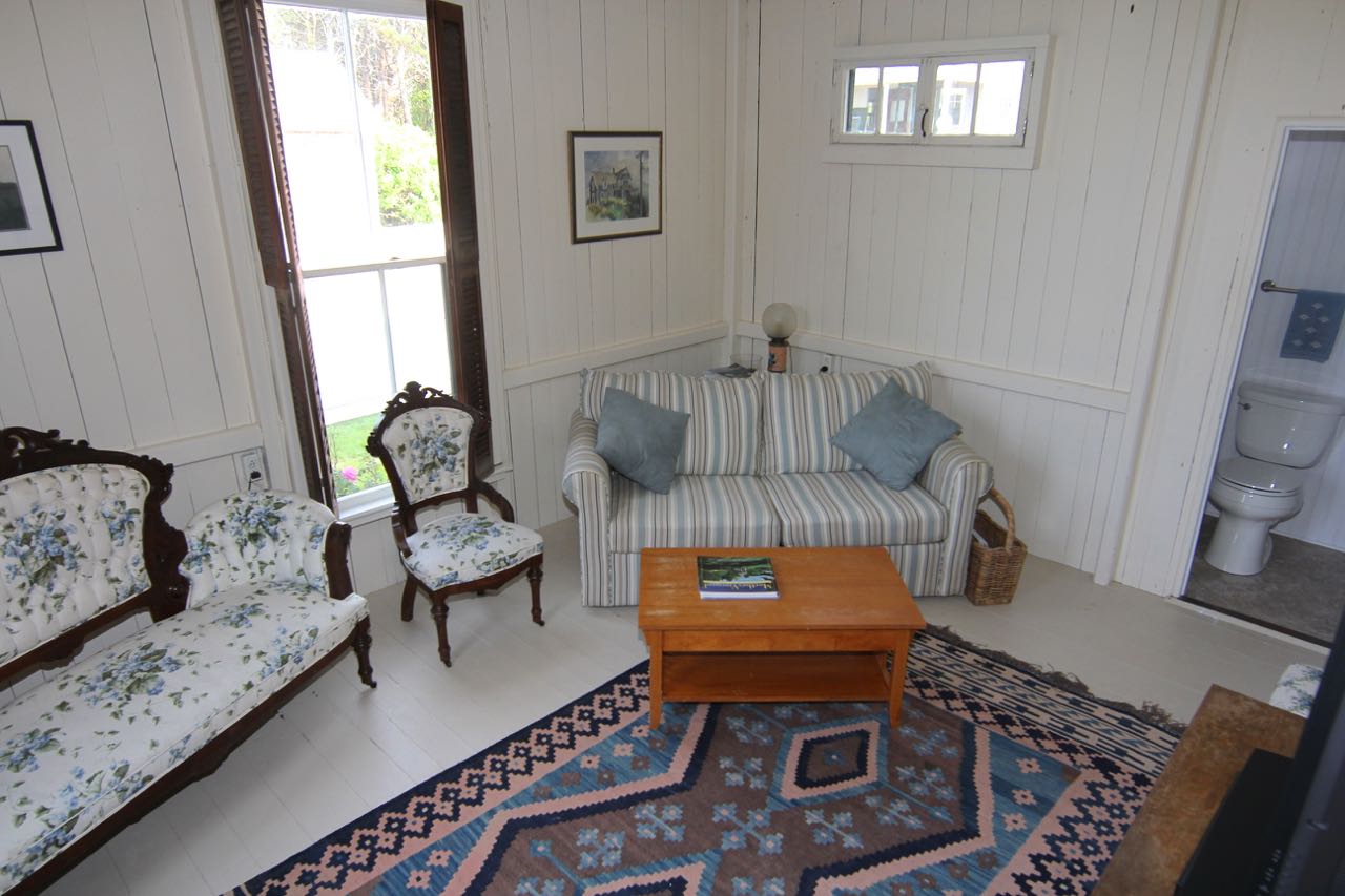 8 Calebs Pond Road Edgartown, MA 02539 - Photo 17 of 49 a living room with furniture