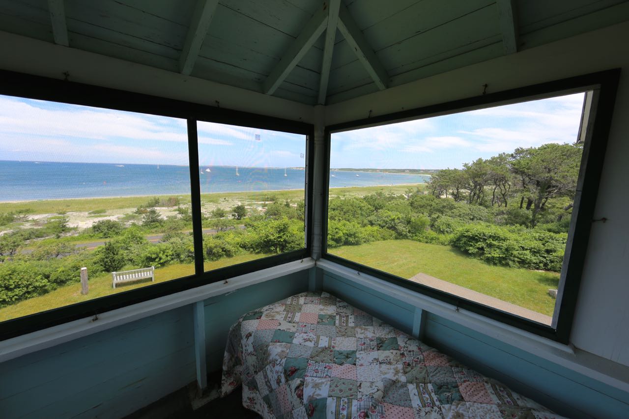 8 Calebs Pond Road Edgartown, MA 02539 - Photo 30 of 49 a view of a glass door with a balcony