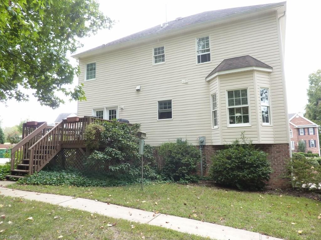 6325 Armsby Road Clemmons, NC 27012 - Photo 2 of 30 Back of Home with a spacious deck
