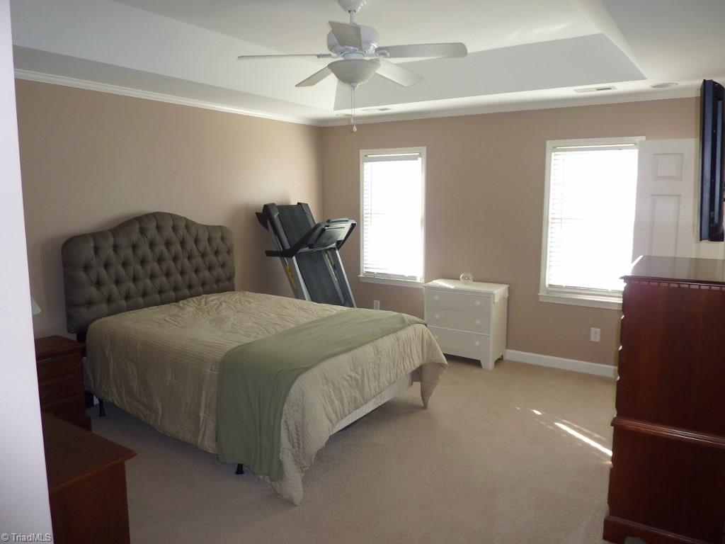 6325 Armsby Road Clemmons, NC 27012 - Photo 14 of 30 Master Suite with huge walk-in closet, trey ceiling, ceiling fan, and private bath.