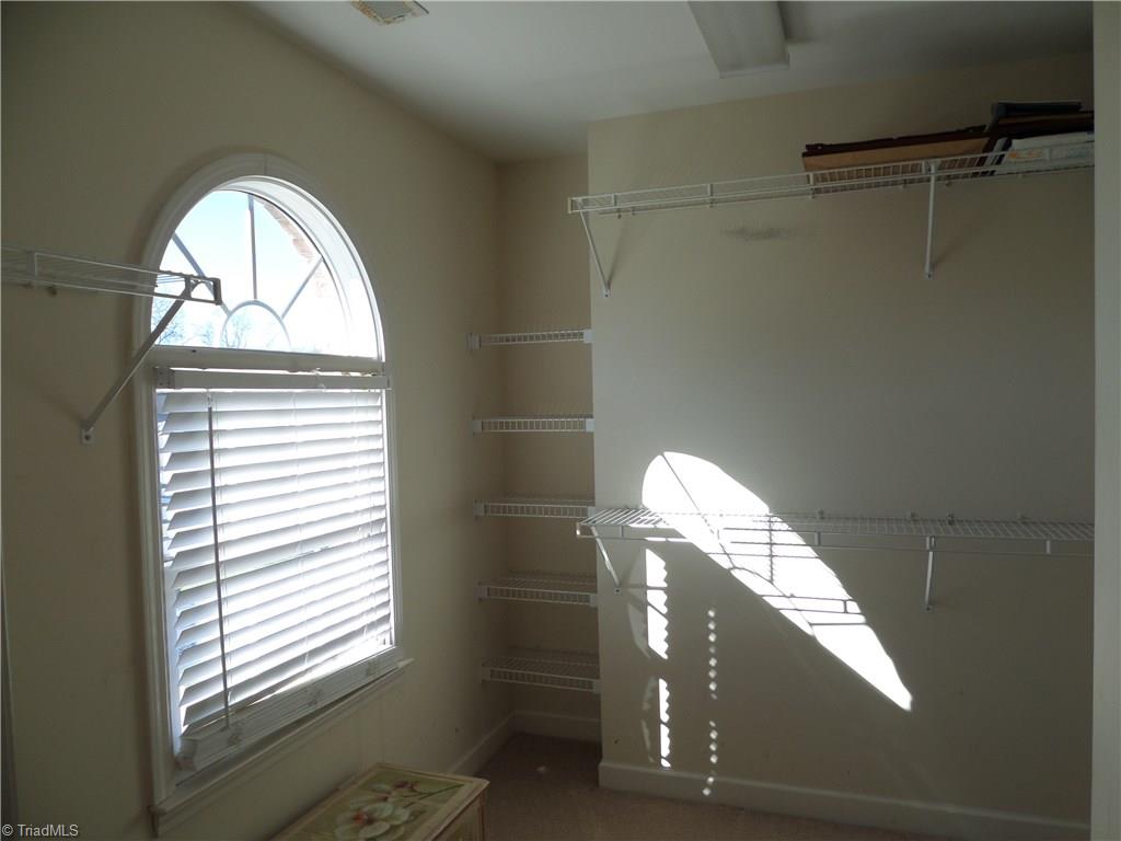 6325 Armsby Road Clemmons, NC 27012 - Photo 17 of 30 Master walk-in closet with plenty of shelving and hanging space