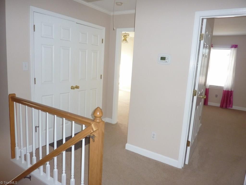 6325 Armsby Road Clemmons, NC 27012 - Photo 20 of 30 Upstairs landing with laundry closet