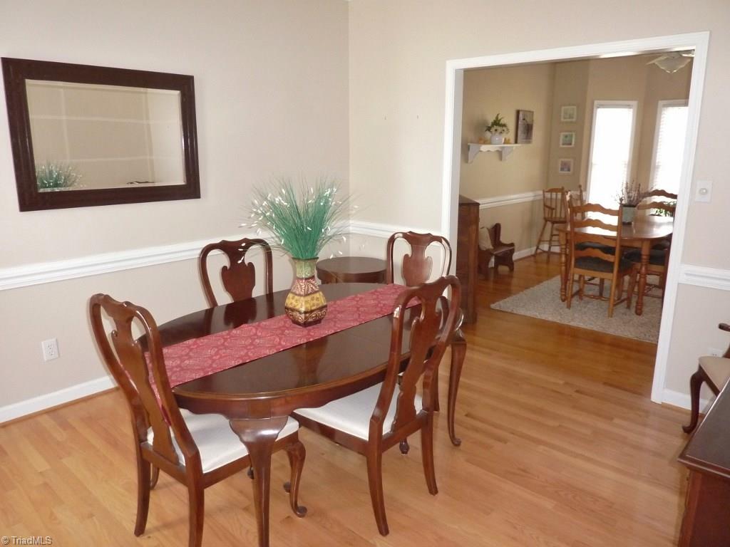 6325 Armsby Road Clemmons, NC 27012 - Photo 9 of 30 Another view of the dining room shows the wide entry to the breakfast room & kitchen.