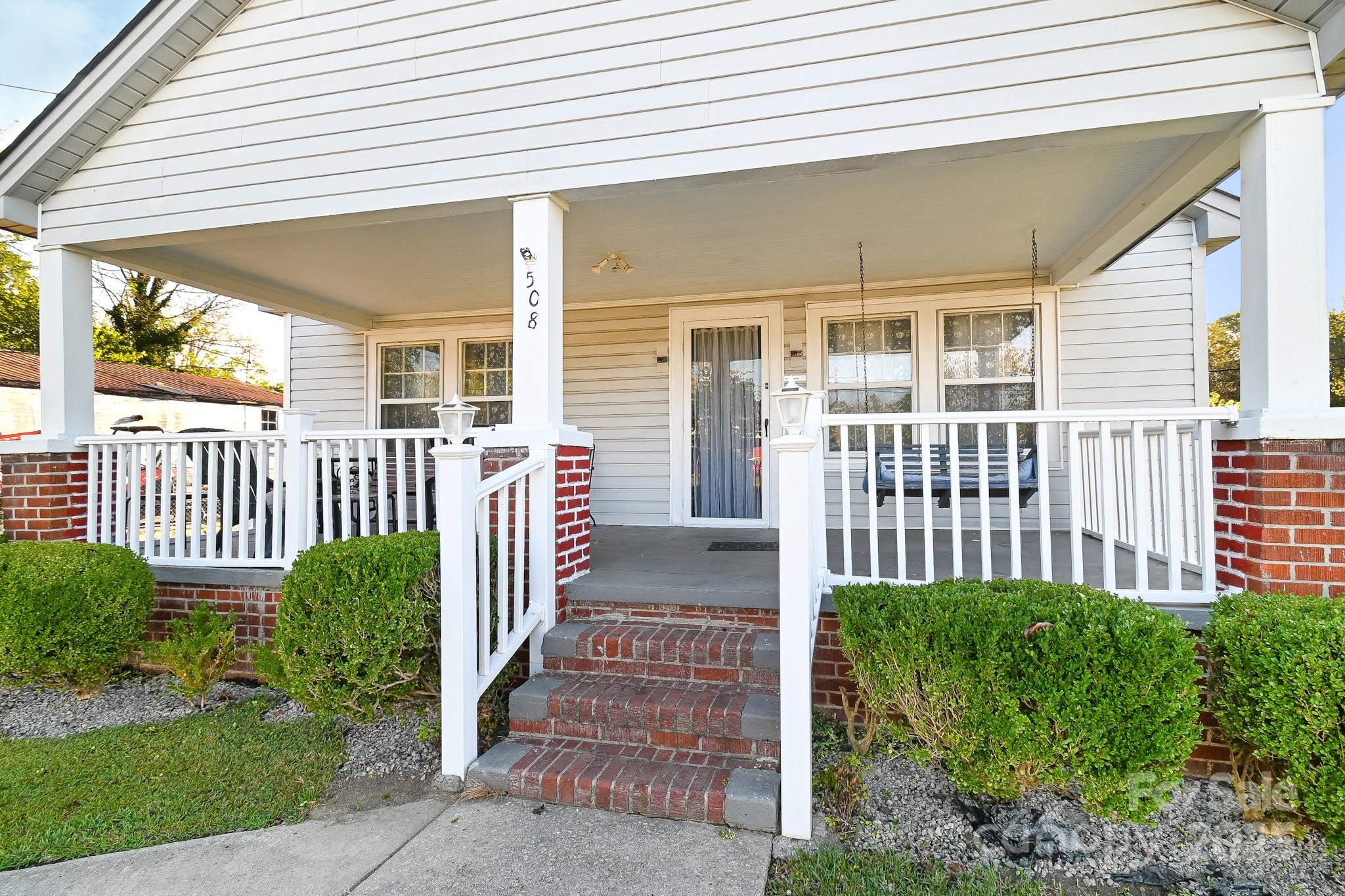 508 Old York Road Chester, SC 29706 - Photo 11 of 48 a front view of a house with a garden