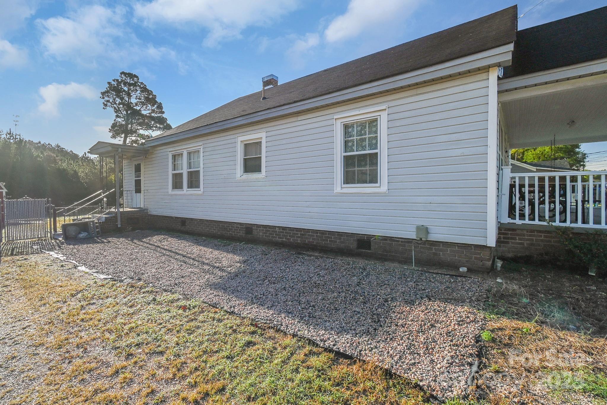 508 Old York Road Chester, SC 29706 - Photo 12 of 48 a view of a house with a yard