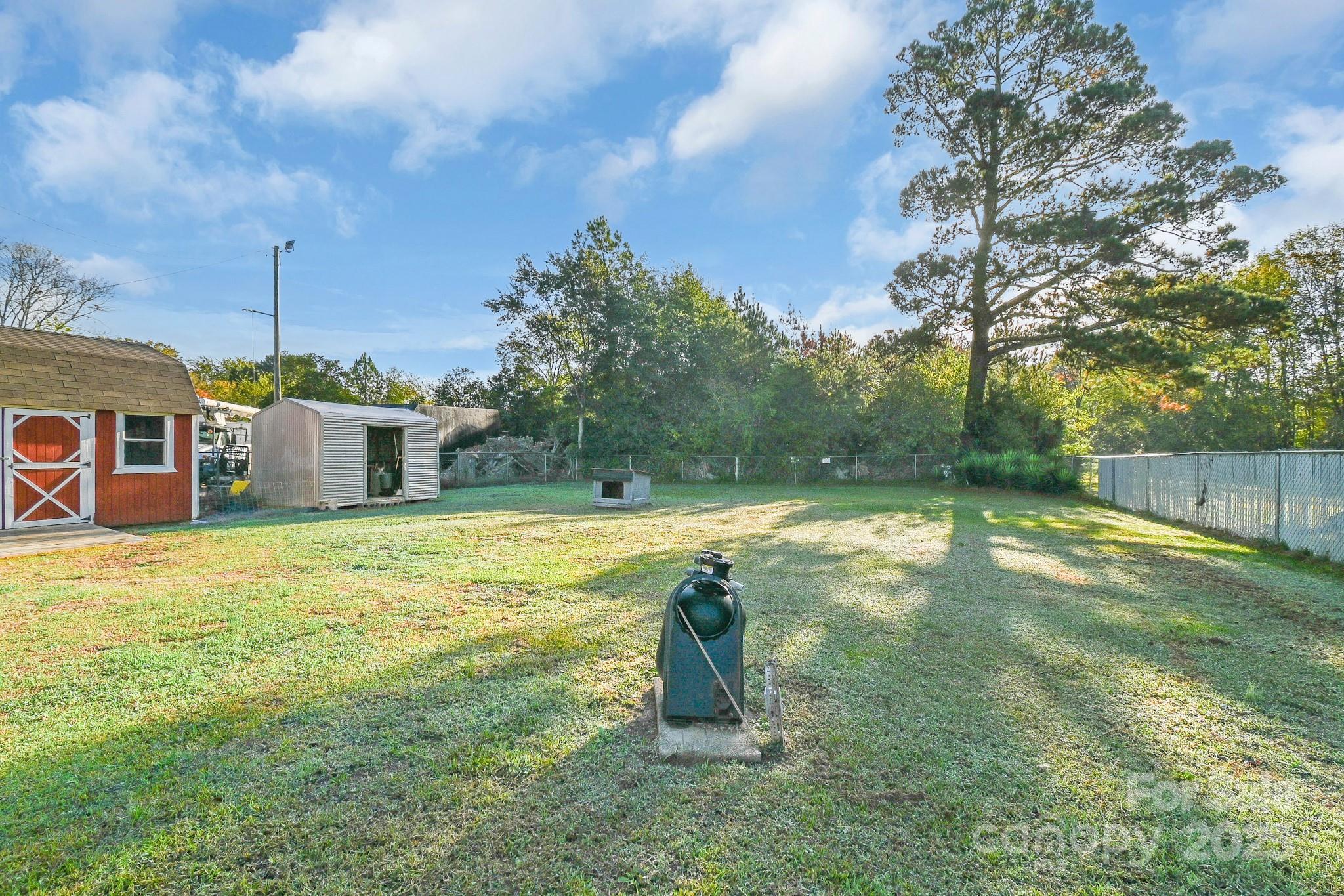 508 Old York Road Chester, SC 29706 - Photo 20 of 48 a backyard of a house with lots of green space
