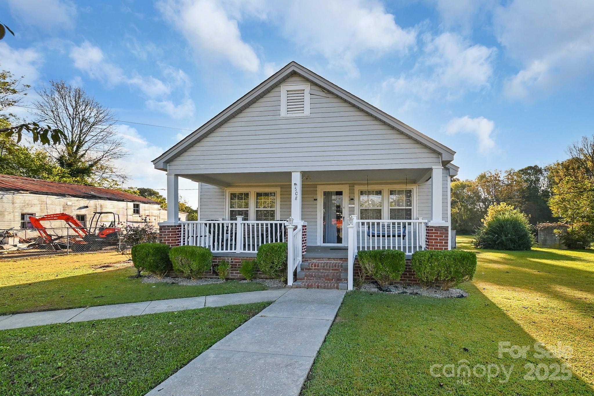 508 Old York Road Chester, SC 29706 - Photo 3 of 48 a front view of a house with a yard and porch