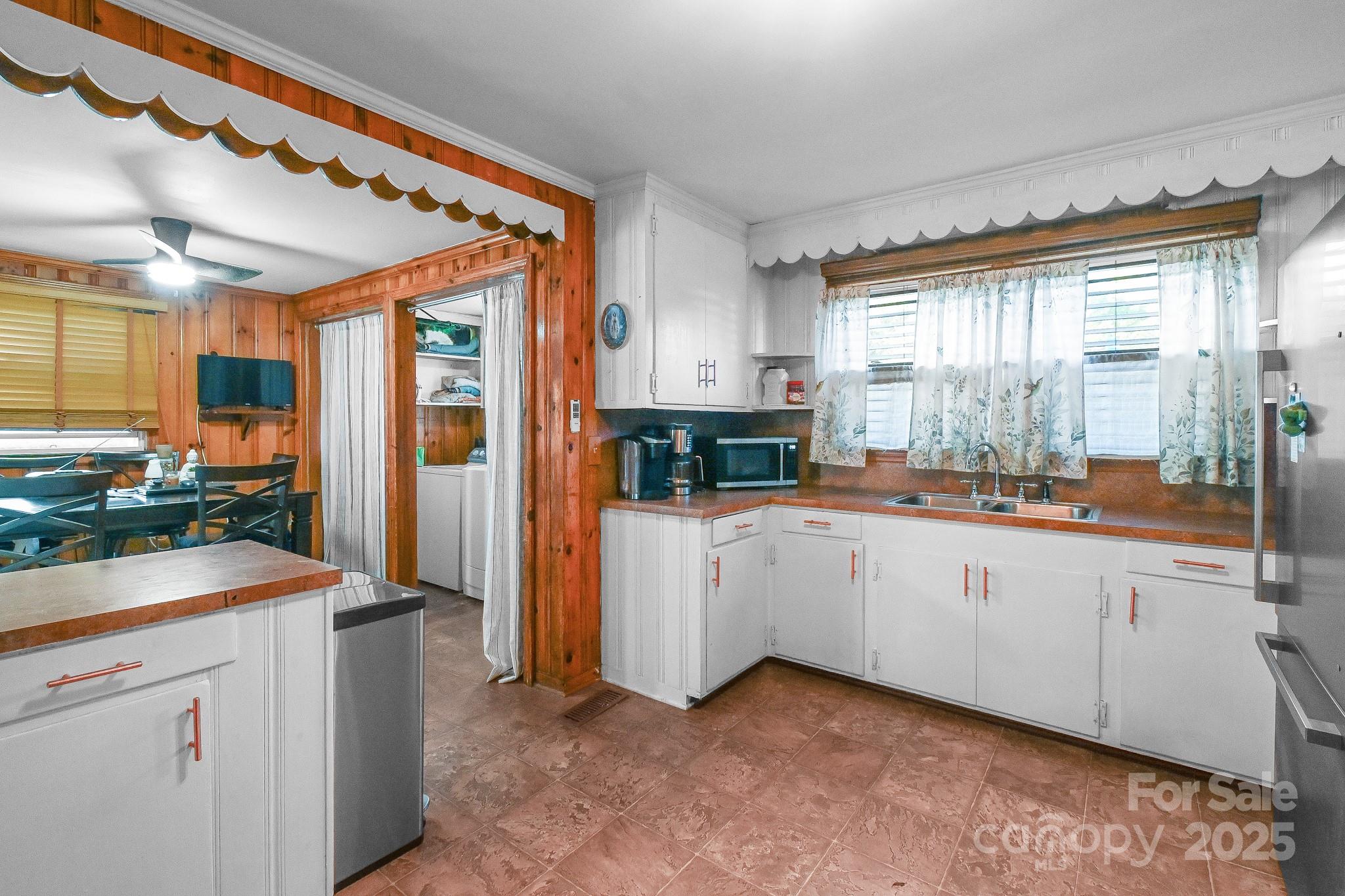 508 Old York Road Chester, SC 29706 - Photo 34 of 48 a kitchen with white cabinets and white appliances