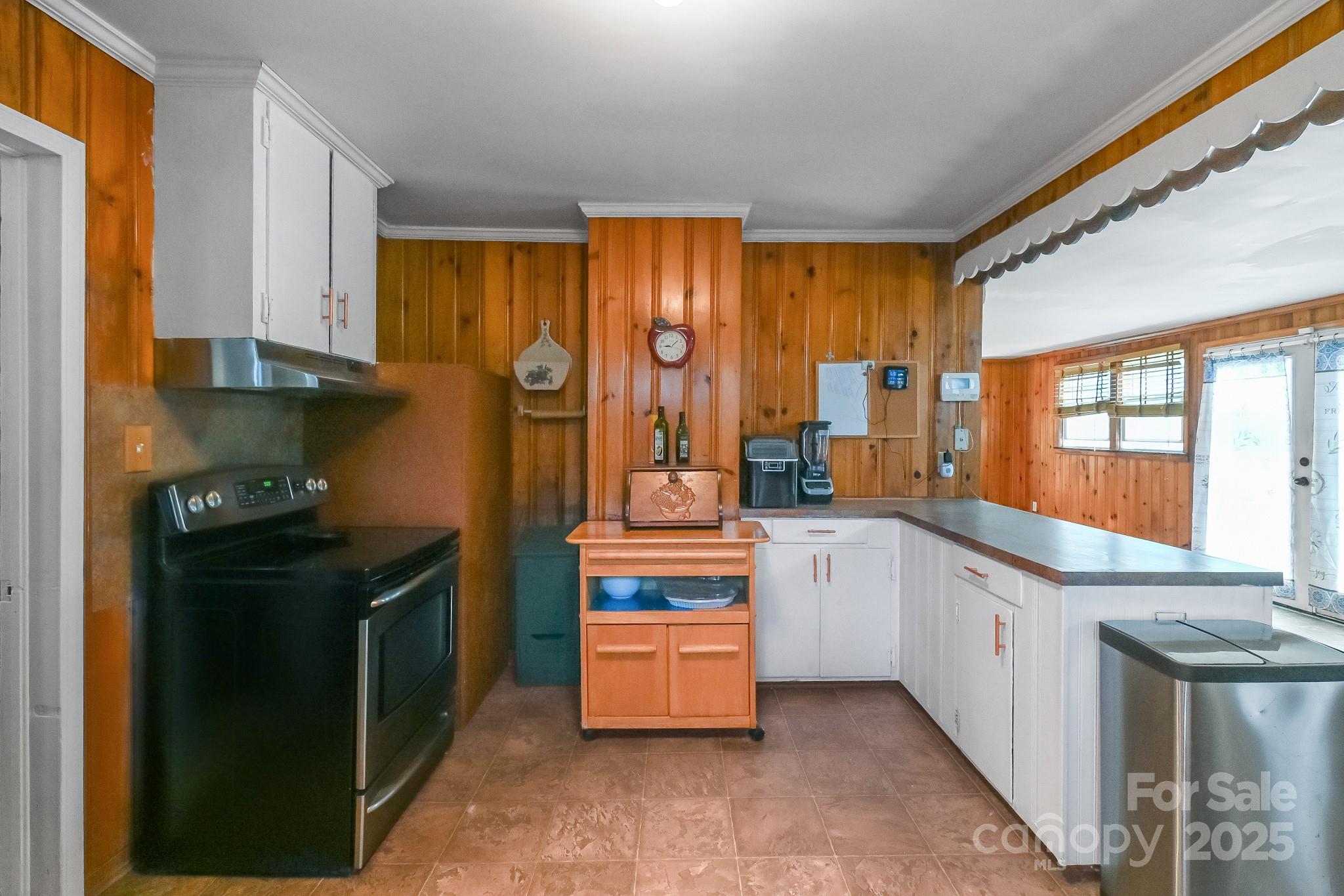 508 Old York Road Chester, SC 29706 - Photo 36 of 48 a kitchen with stainless steel appliances granite countertop a stove and a refrigerator
