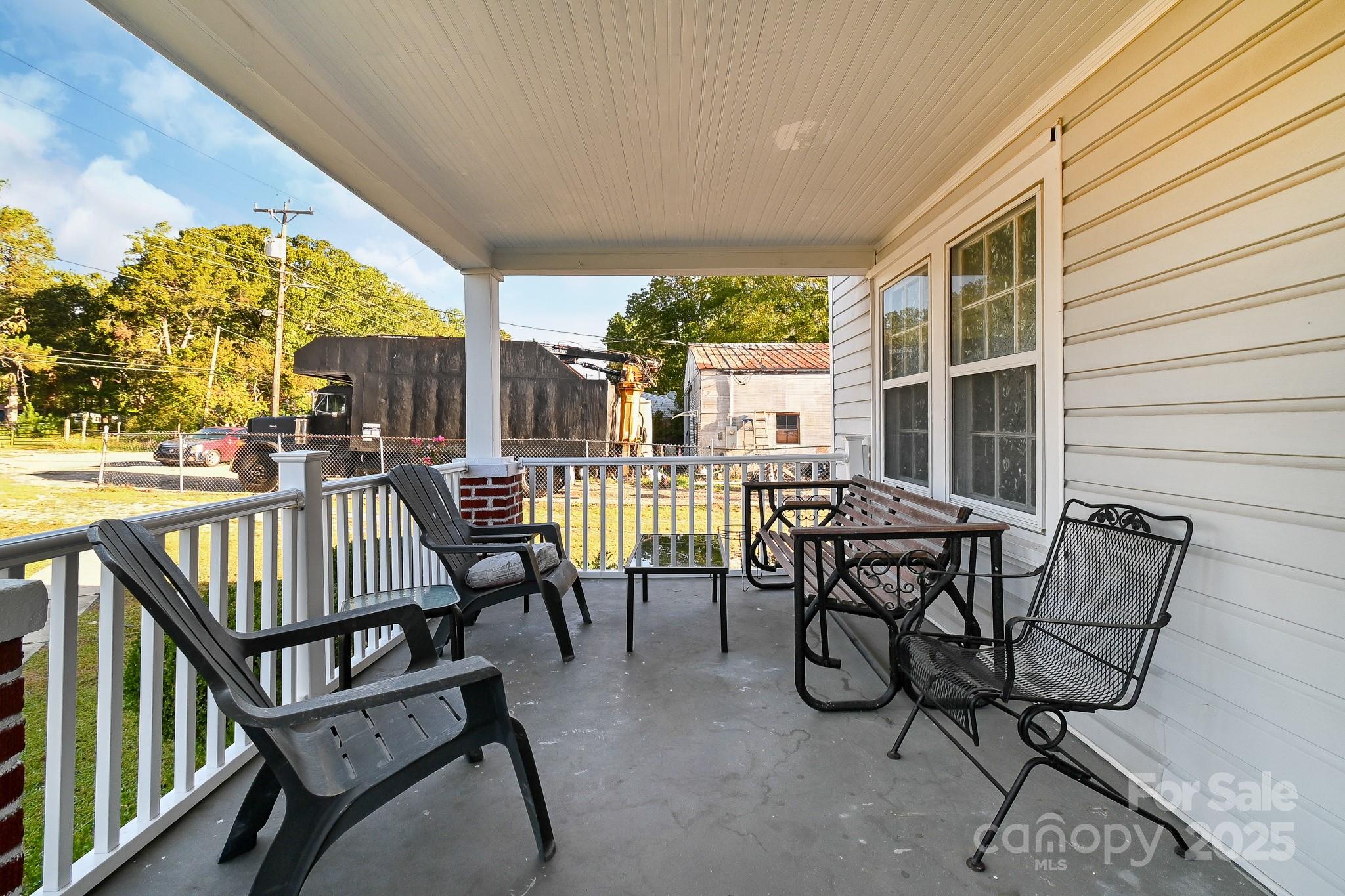 508 Old York Road Chester, SC 29706 - Photo 8 of 48 a view of a chairs and table in patio