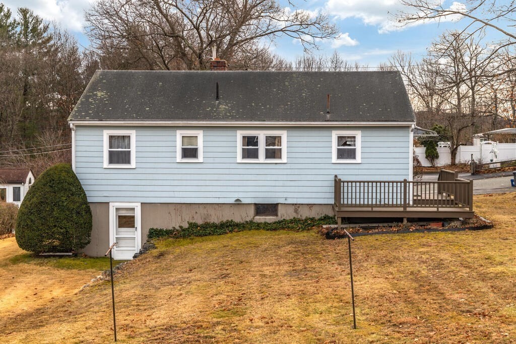 21 Roman Road Woburn, MA 01801 - Photo 24 of 29 a view of a house with a yard
