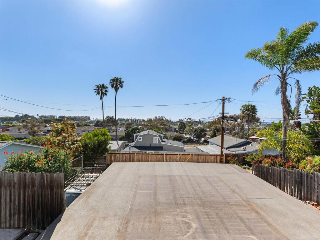 852 Dewitt Avenue Encinitas, CA 92024 - Photo 31 of 41 a view of a terrace with a bench