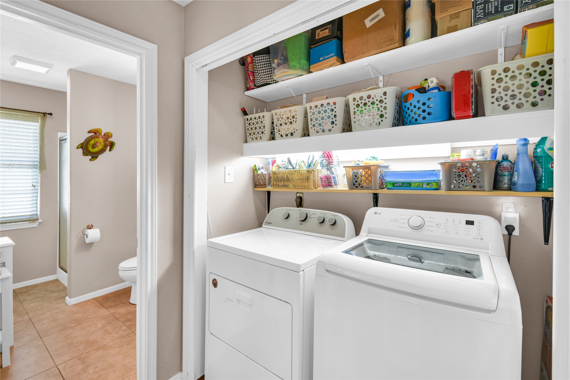 115 Driftwood Road Freeport, TX 77541 - Photo 21 of 21 a utility room with dryer and washer