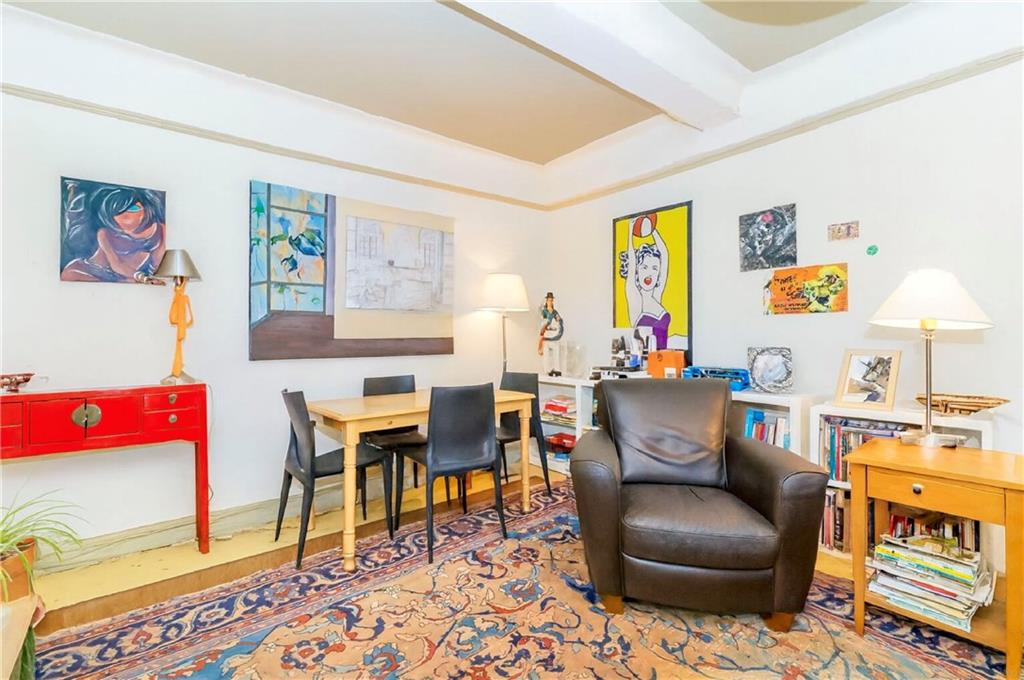 70 Remsen Street, Unit 4F Brooklyn, NY 11201 - Photo 7 of 11 a living room with furniture and a couch