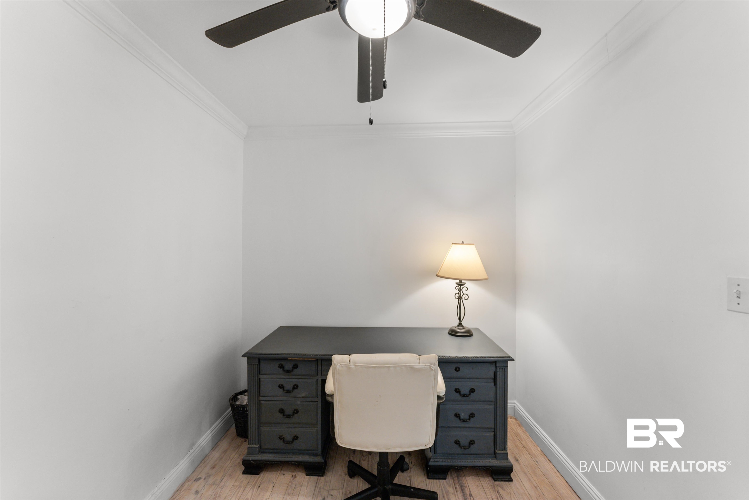 6447 Bemis Lane Bon Secour, AL 36511 - Photo 55 of 62 Dedicated office space with light wood-finish flooring, crisp white walls, crown molding, and a ceiling fan with integrated lighting