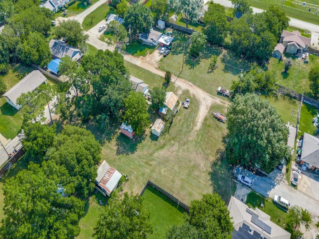 219 East Evans Street Pilot Point, TX 76258 - Photo 2 of 5 an aerial view of residential house with outdoor space and swimming pool