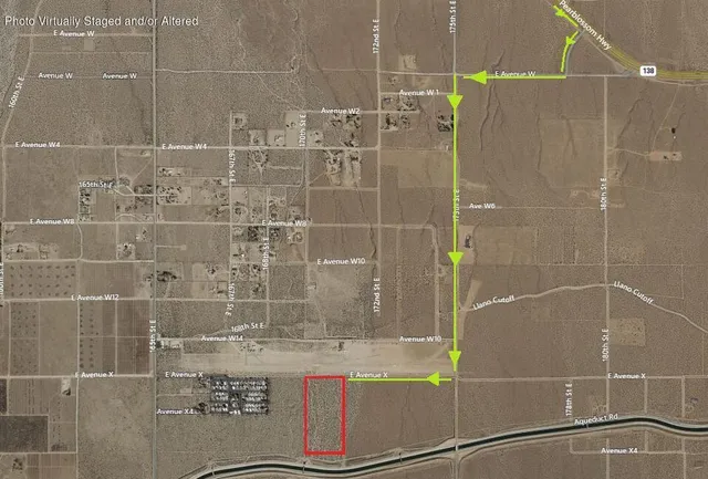 a bathroom with a shower and a mirror