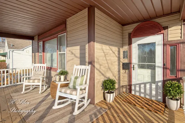a view of a balcony with chairs