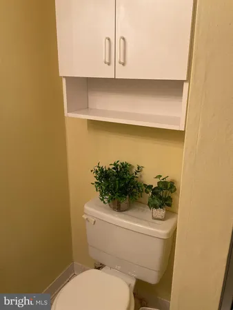 a bathroom with a toilet and a sink