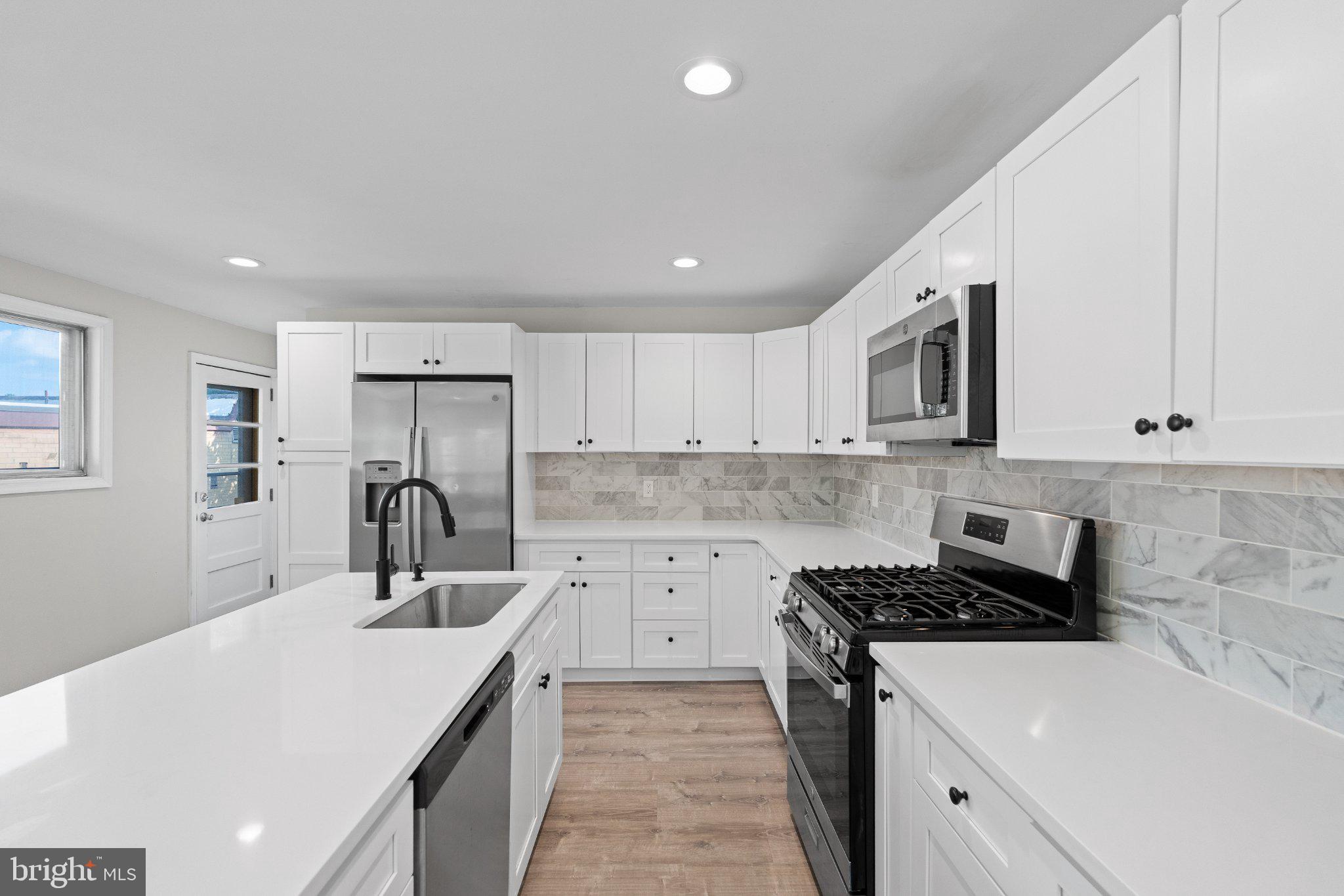 205 Juniper Road, Unit 288 Havertown, PA 19083 - Photo 4 of 28 Sleek modern kitchen with elegance.