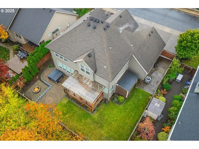 an aerial view of a house with a garden