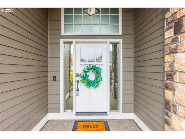 a view of a door and a window