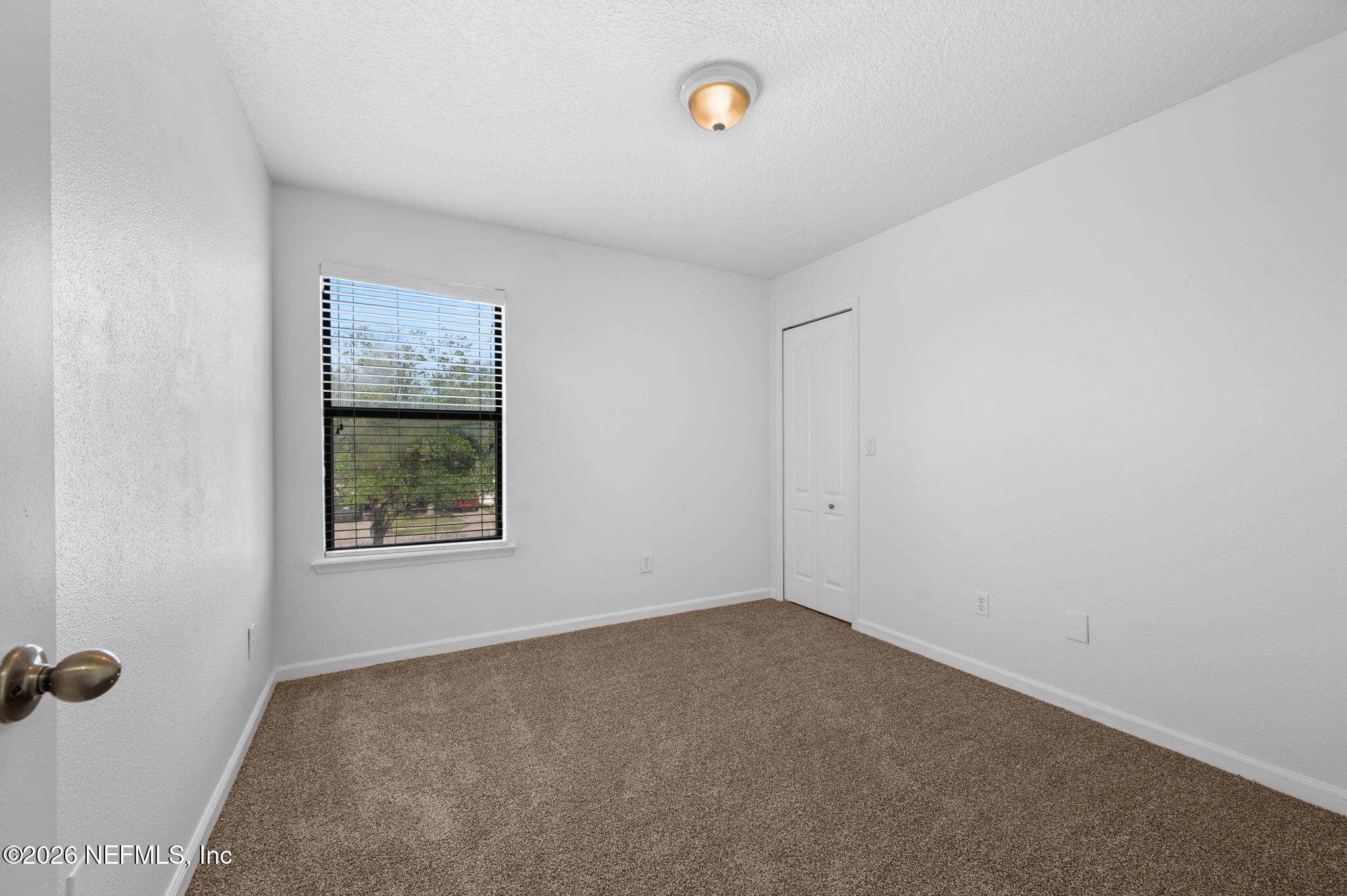 253 Syrah Way St. Augustine, FL 32084 - Photo 27 of 39 an empty room with windows