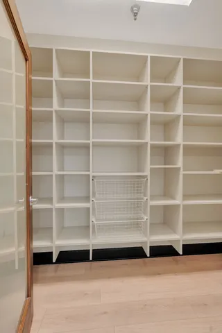 a view of an empty room with empty racks