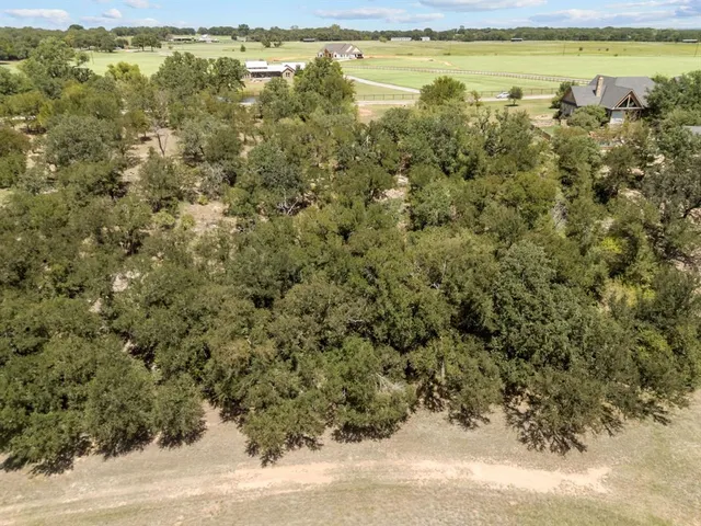 a view of a yard with an outdoor space