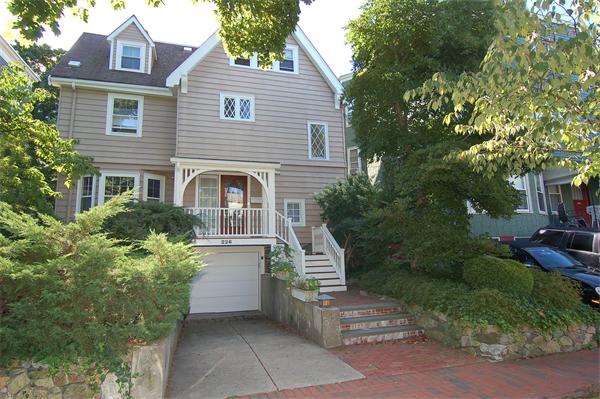 226 Upland Road Cambridge, MA 02140 - Photo 1 of 26 a front view of a house with a yard