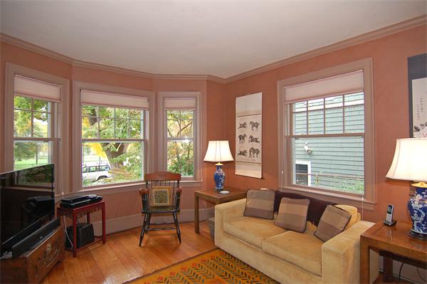 226 Upland Road Cambridge, MA 02140 - Photo 11 of 26 a living room with furniture and a large window