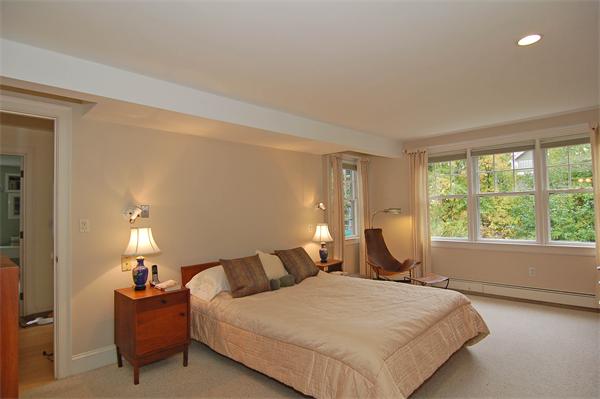 226 Upland Road Cambridge, MA 02140 - Photo 14 of 26 a bedroom with a bed and window