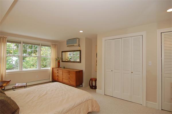 226 Upland Road Cambridge, MA 02140 - Photo 15 of 26 a bedroom with a bed and a window