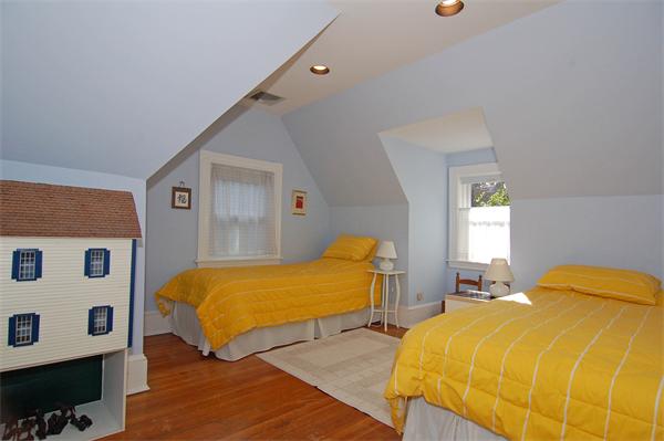 226 Upland Road Cambridge, MA 02140 - Photo 17 of 26 a bedroom with bed and a window