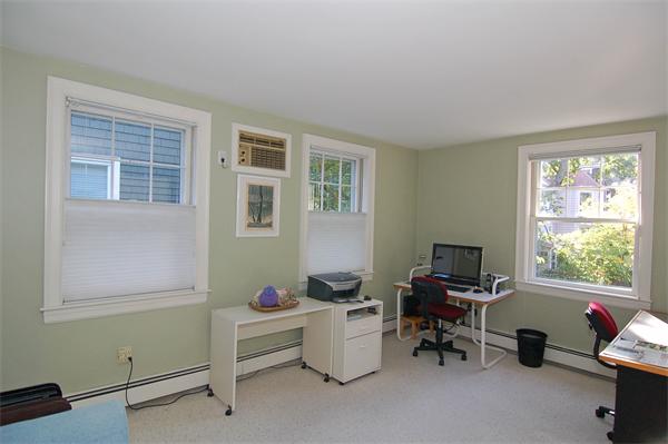 226 Upland Road Cambridge, MA 02140 - Photo 18 of 26 a room with furniture and a window