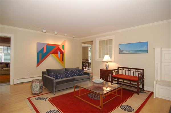 226 Upland Road Cambridge, MA 02140 - Photo 2 of 26 a living room with furniture a rug and a window