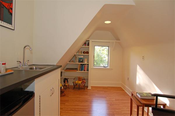 226 Upland Road Cambridge, MA 02140 - Photo 21 of 26 a view of a livingroom with furniture and staircase