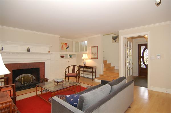 226 Upland Road Cambridge, MA 02140 - Photo 3 of 26 a living room with furniture and a fireplace