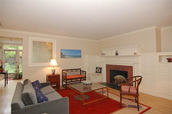 226 Upland Road Cambridge, MA 02140 - Photo 4 of 26 a living room with furniture and a fireplace