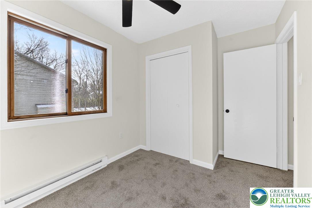 4127 Indian Avenue Pocono Summit, PA 18346 - Photo 26 of 41 a view of an empty room with a window