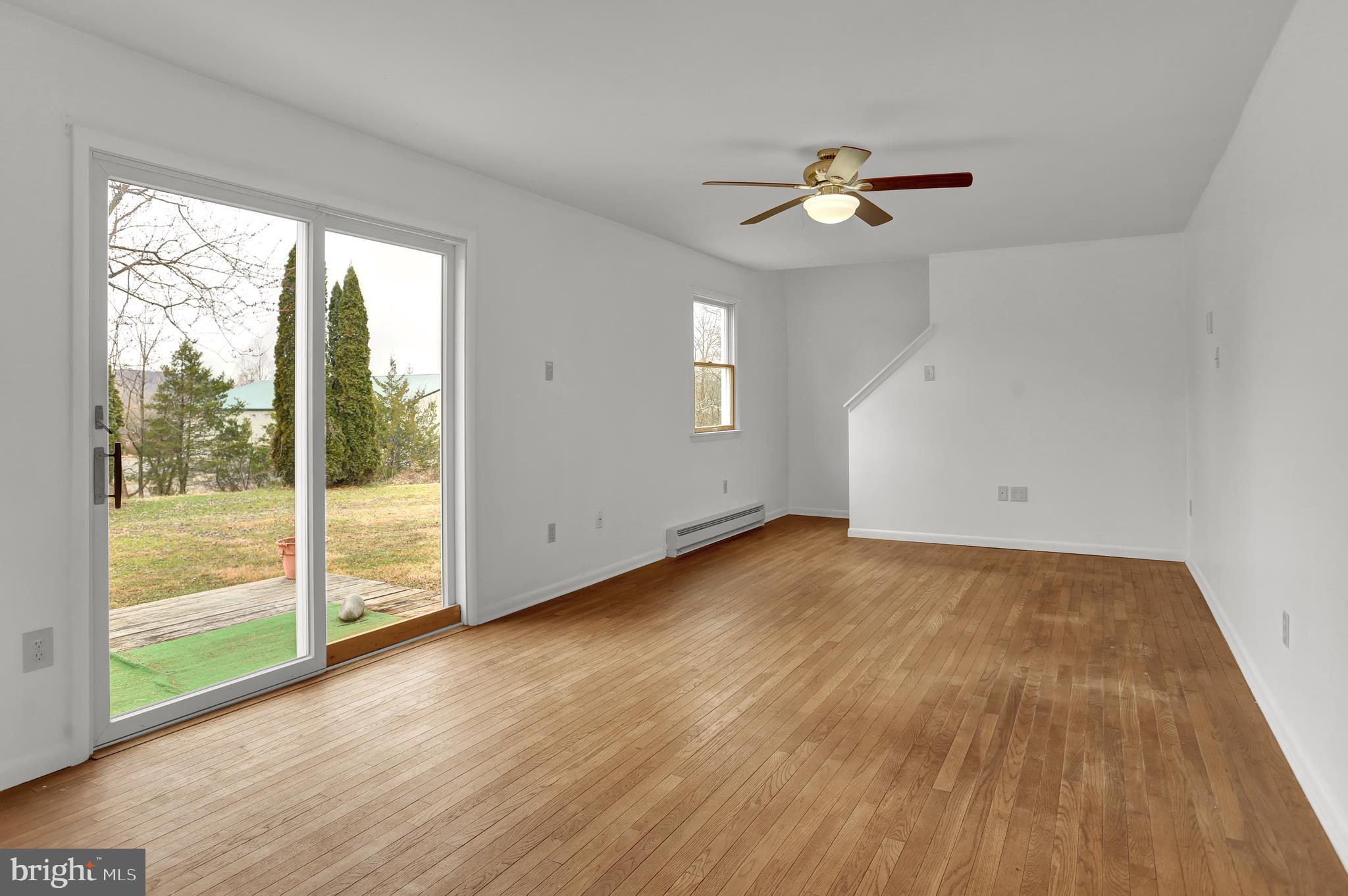 1131 Station Road Palm, PA 18070 - Photo 2 of 36 Living room with sliders