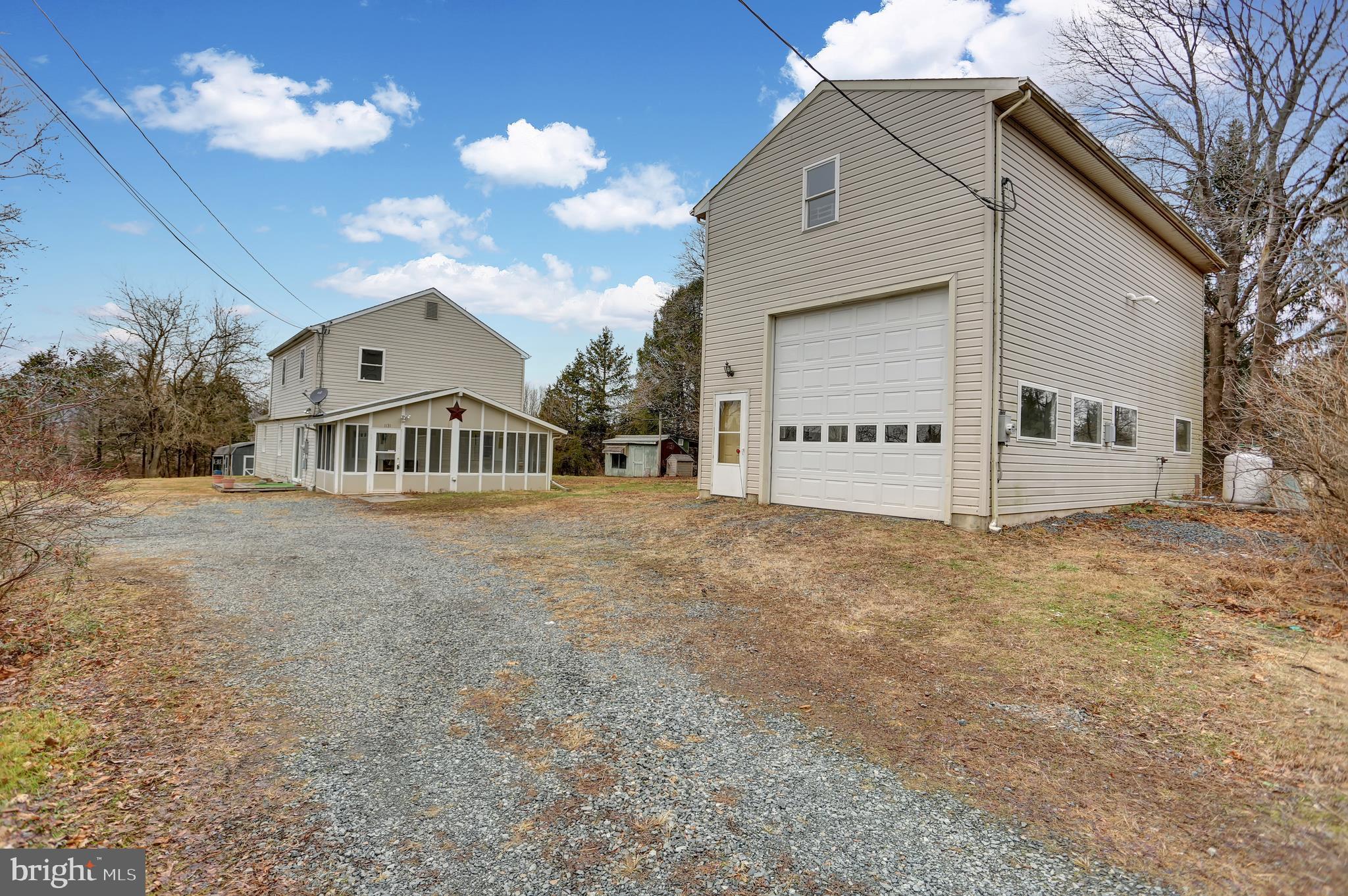 1131 Station Road Palm, PA 18070 - Photo 24 of 36 Oversized garage with room above