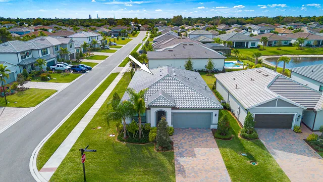 a view of swimming pool with outdoor seating