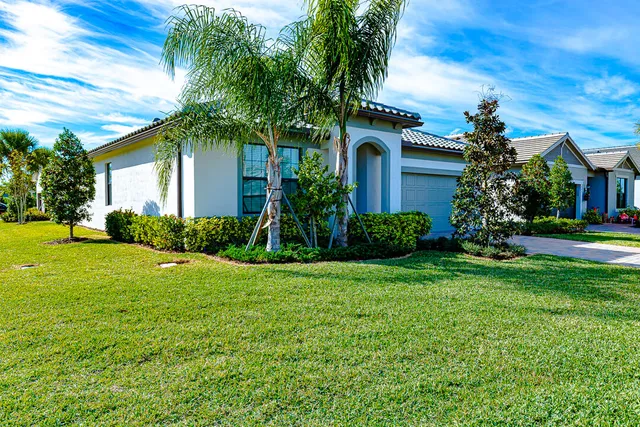a outdoor living space with furniture and garden view