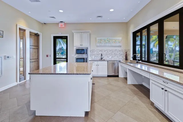 a view of a lobby with a garden and plants