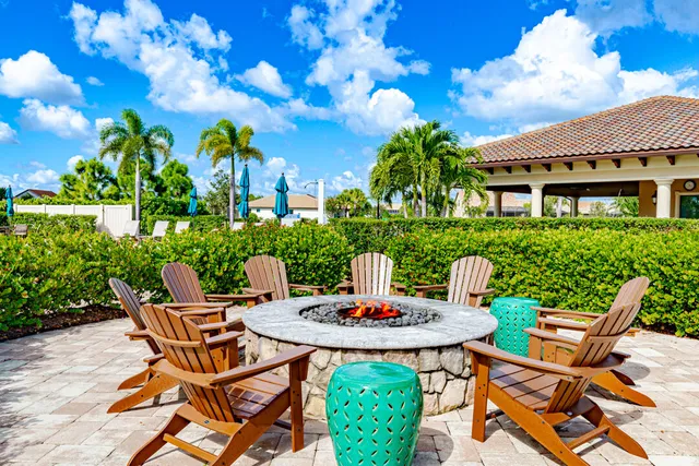 a view of a house with a yard and plants